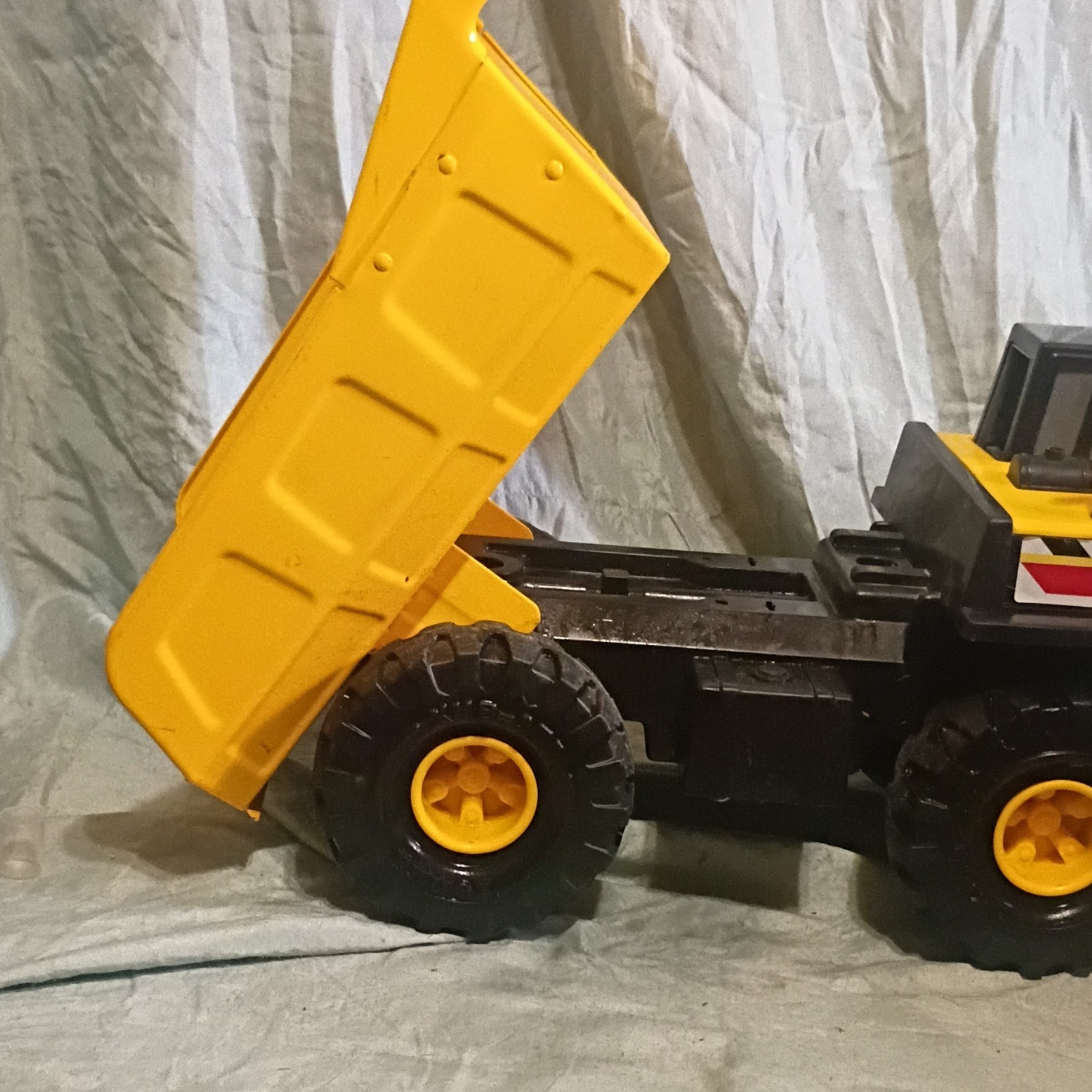 Tonka 354 Yellow Black Plastic Dump Truck Toy with Dump Bed
