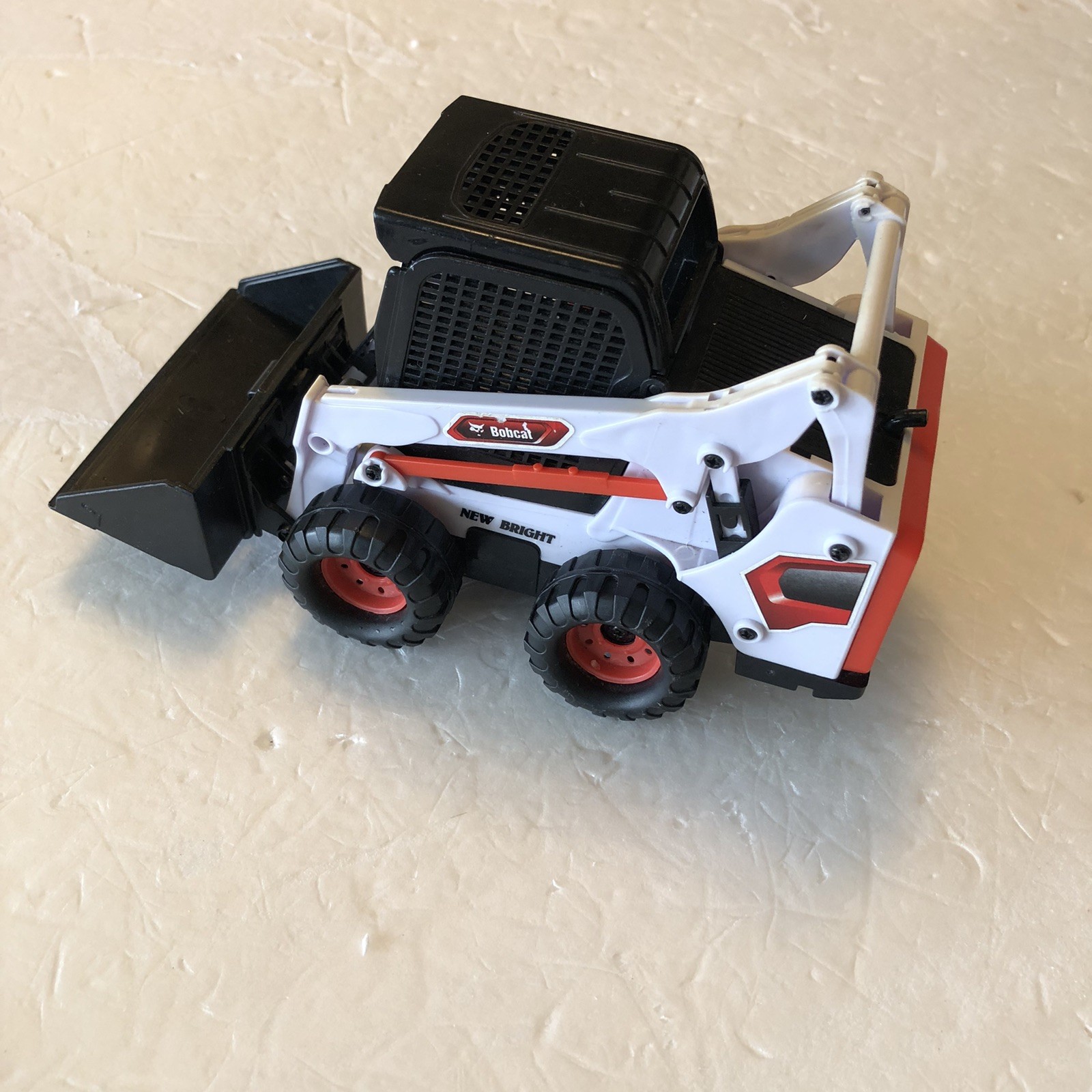 New Bright Bobcat Toy Skid-Steer Loader Plastic – Photos Have Measurements