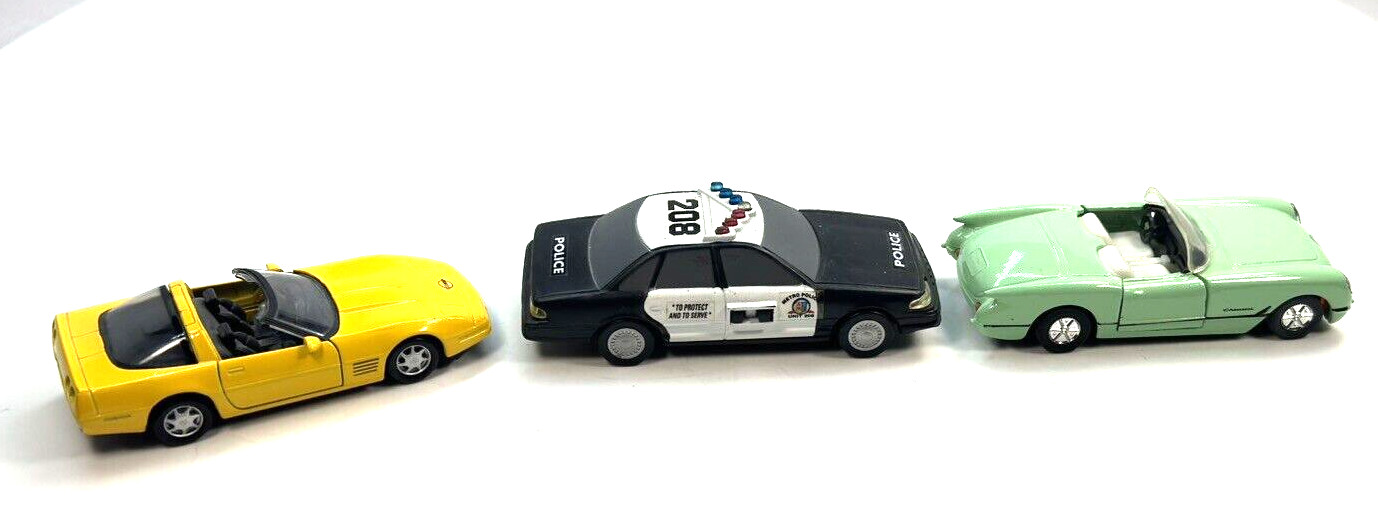 3 Die Cast Vehicles Police Car, Z06 Corvette, 56 Corvette Convertible