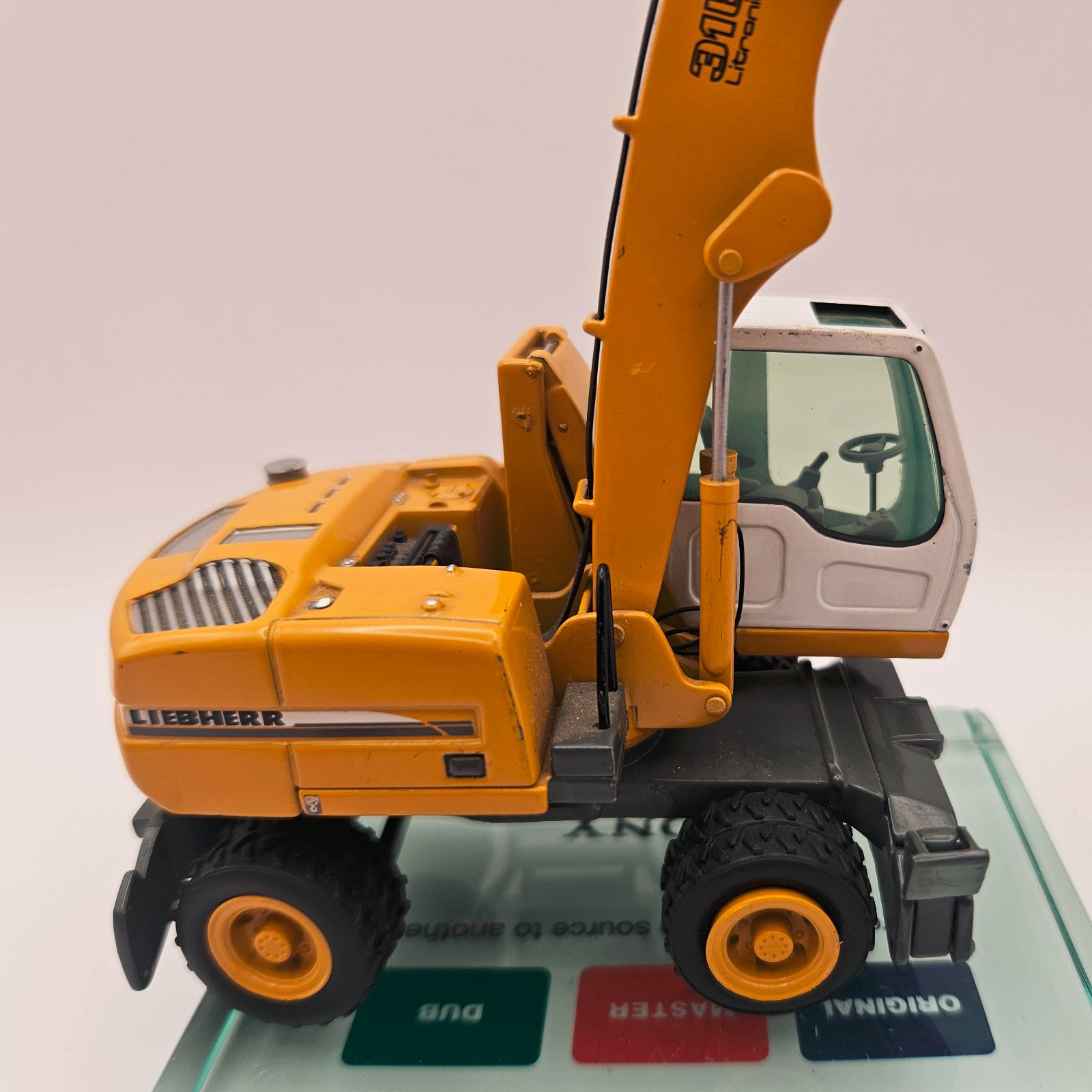 NZG 497 1:50 Scale Diecast Liebherr 316 Wheeled Excavator Scrap Handler Litronic