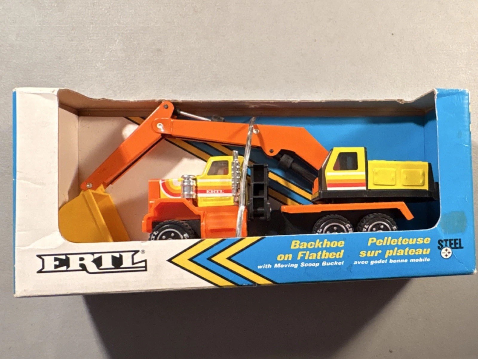 ERTL Backhoe on Flatbed Steel Yellow Orange Black Moving Scoop Bucket 1987