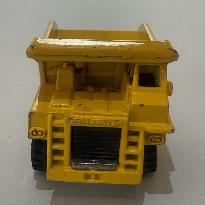 Hot Wheels Caterpillar Dump Truck 1:64 Diecast Yellow/Black Tipping Bed 1979