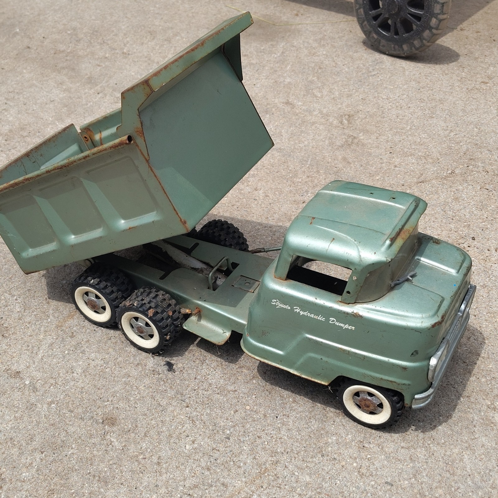 Vintage Green Toy Dump Truck with Tilting Dump Bed