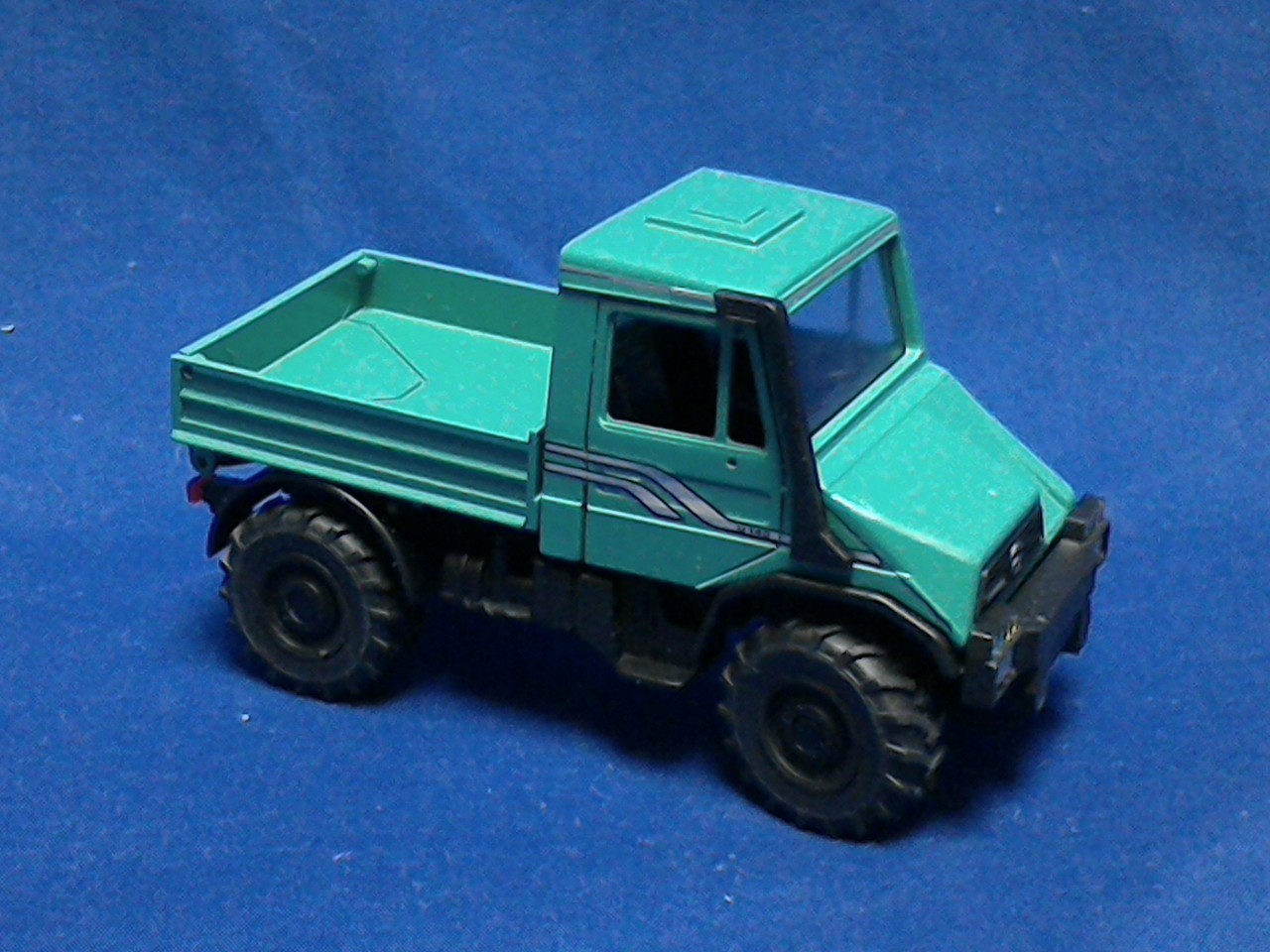 NZG 371-65G Unimog U140 Turquoise – Open Back 1/43 Die-cast MIB