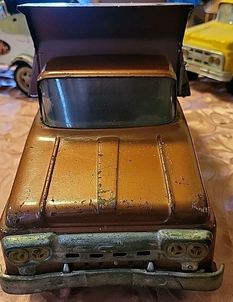 Vintage Tonka Hydraulic Bronze Dump Truck Toy Very Good Condition.