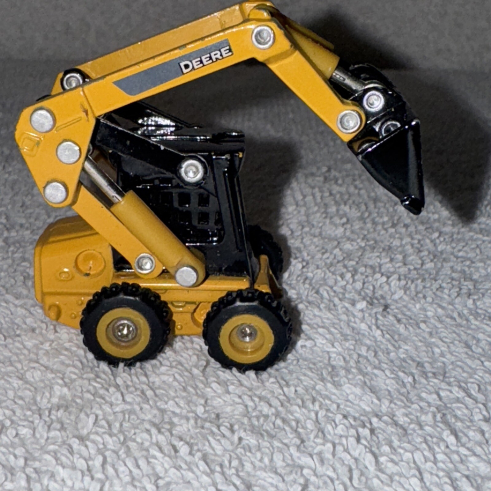 Ertl 1/64 John Deere 320D Skid Steer Model Loader