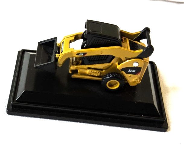 Norscot Group Inc. CAT 272C Skid Steer Loader on stand -missing front wheels