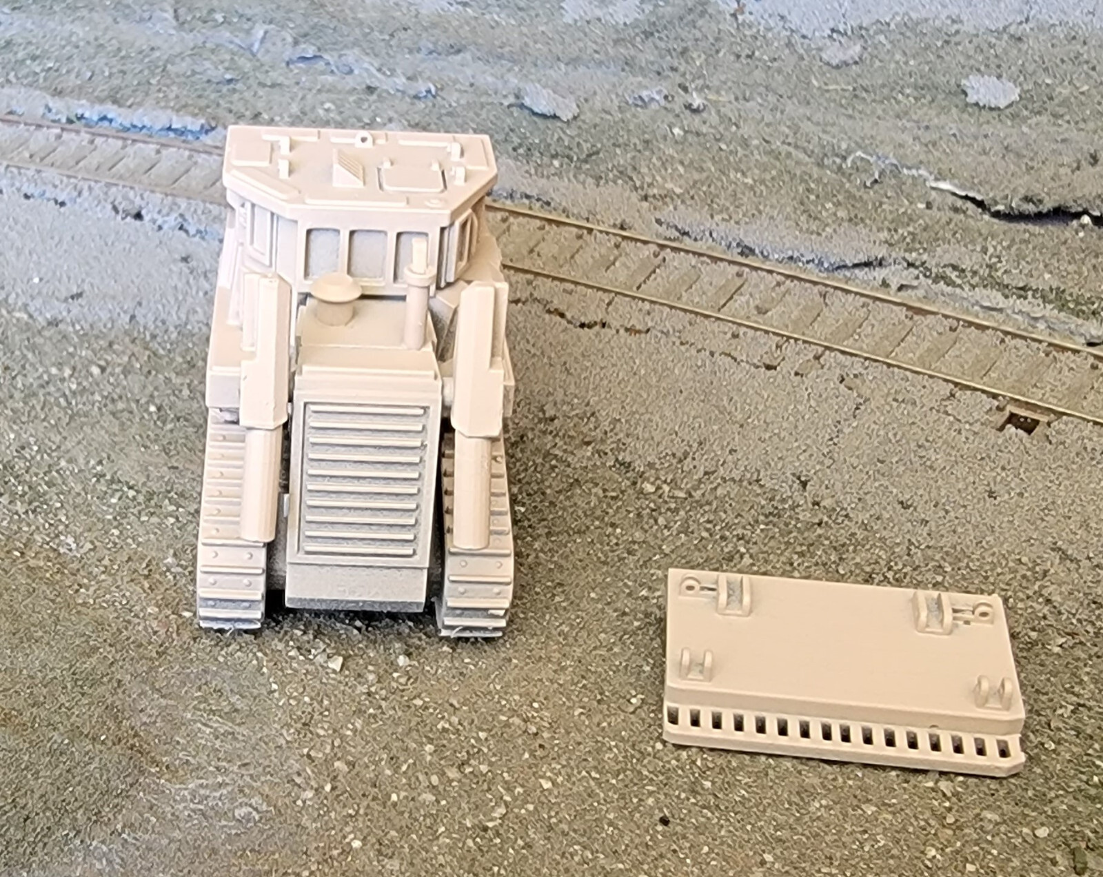 One 1/87 scale Cat D9R armored bulldozer, separate blade, desert tan!