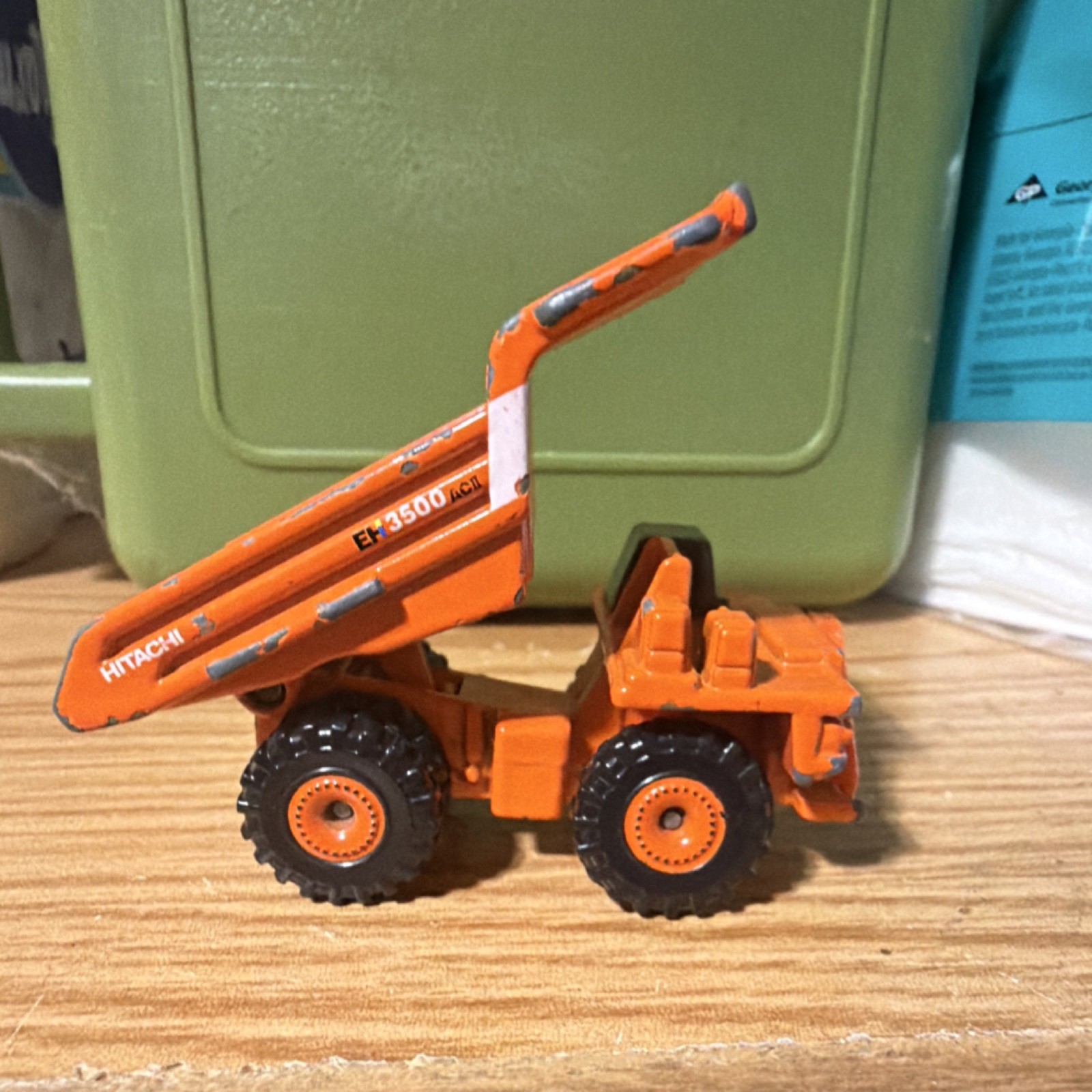 Tomica Hitachi EH3500ACII Dump Truck No.130 1:144 Diecast Tipping Orange