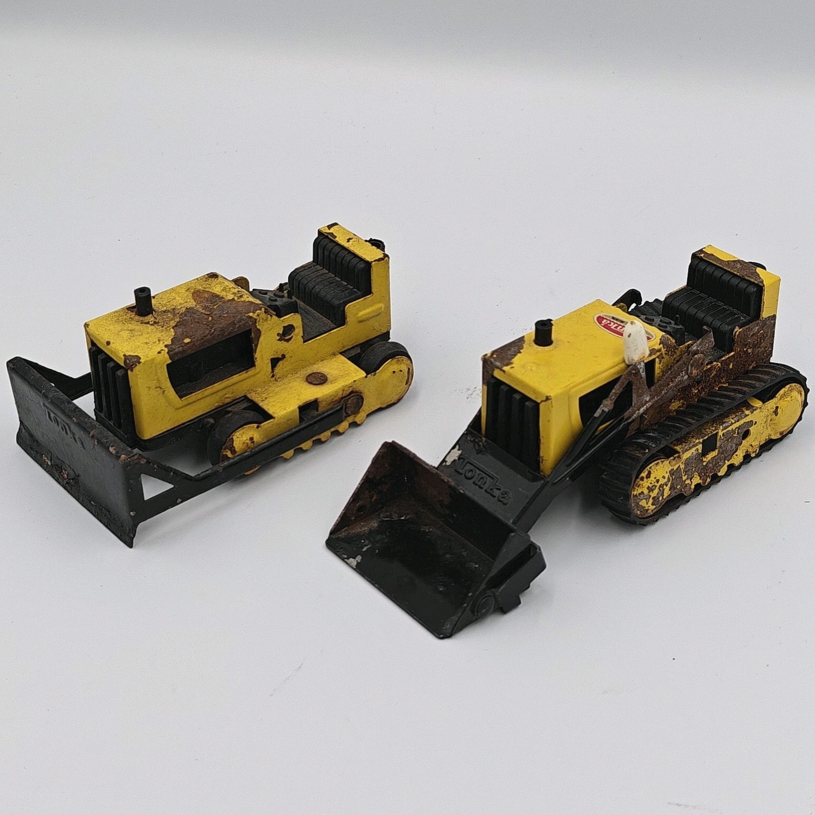 2 Vtg Tonka toys 70’s metal & plastic tractor plows – Made in USA (4″ x 2 1/2″)
