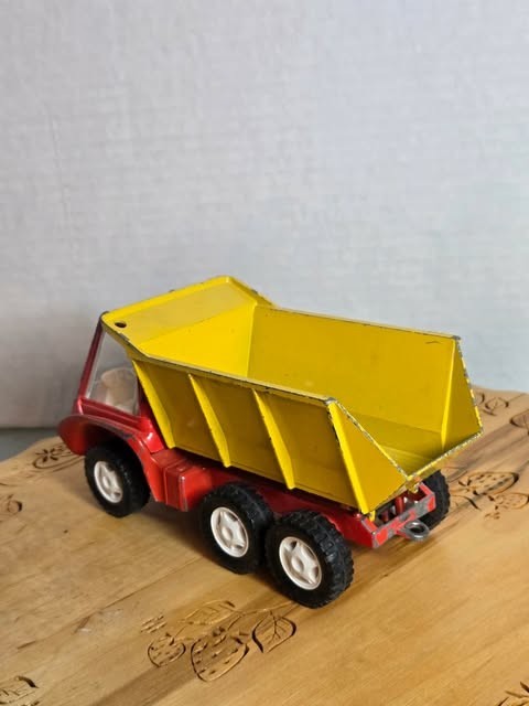 This vintage 1969 Gabriel Industries Inc. metal dump truck