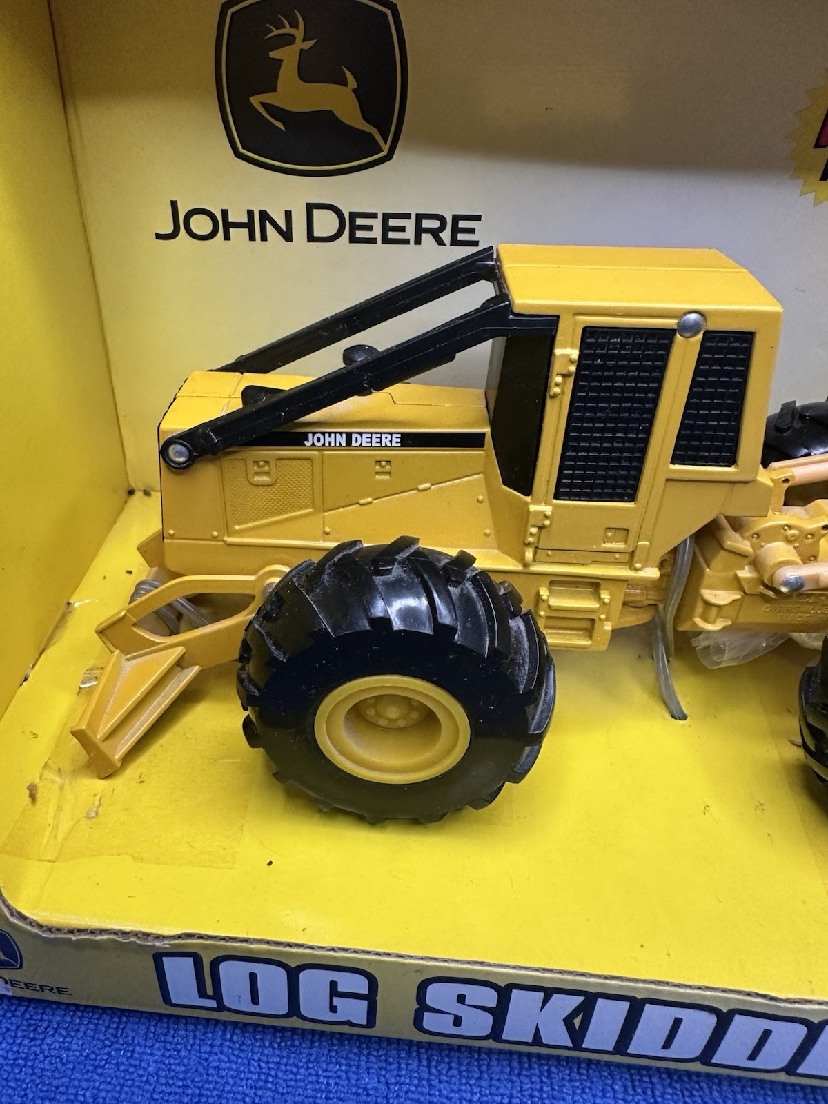 Ertl 1/32 John Deere Log Skidder yellow New In Box.