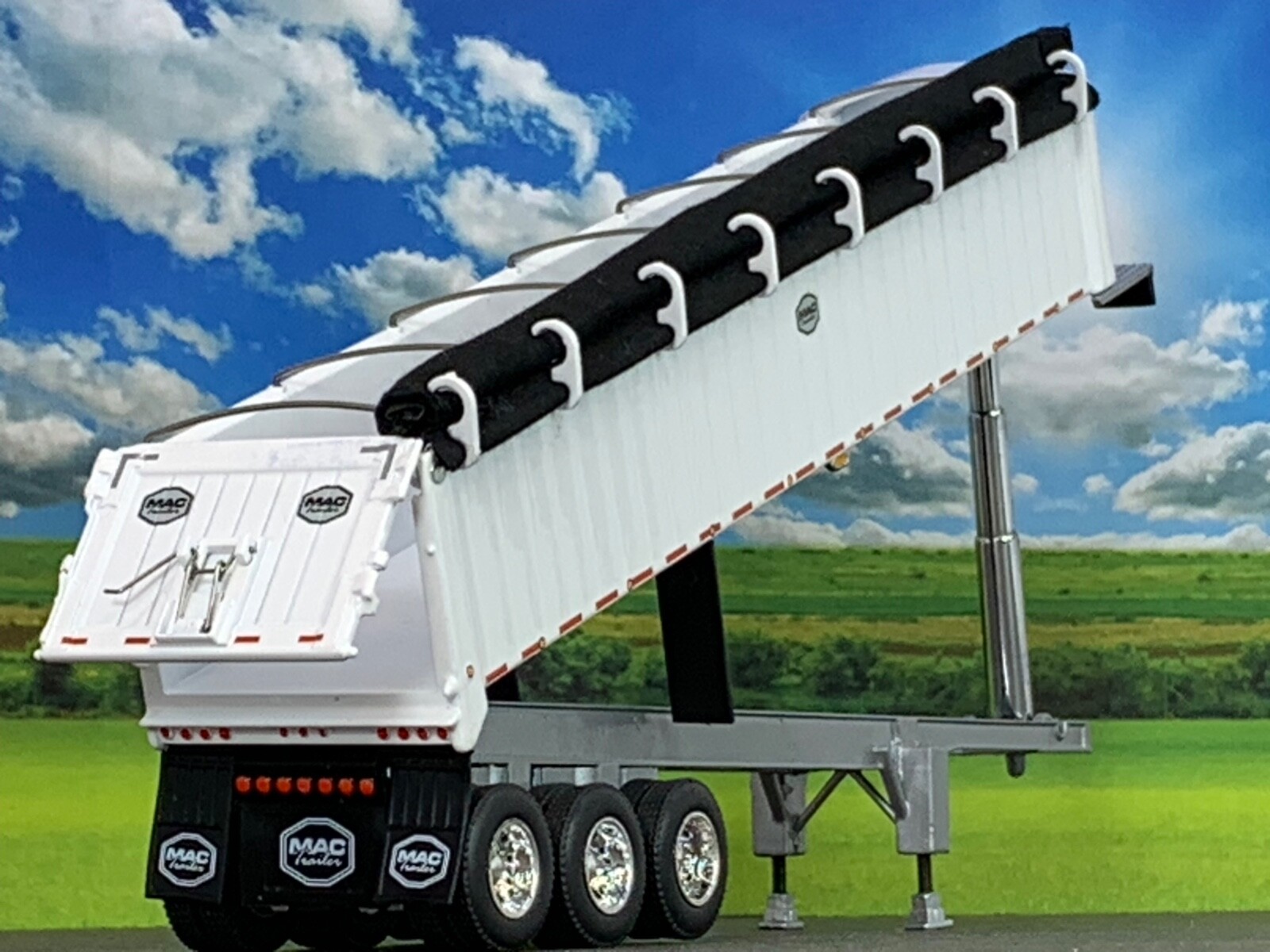 1/64 DCP WHITE MAC TRI AXLE END DUMP TRAILER W/ BLACK TARP