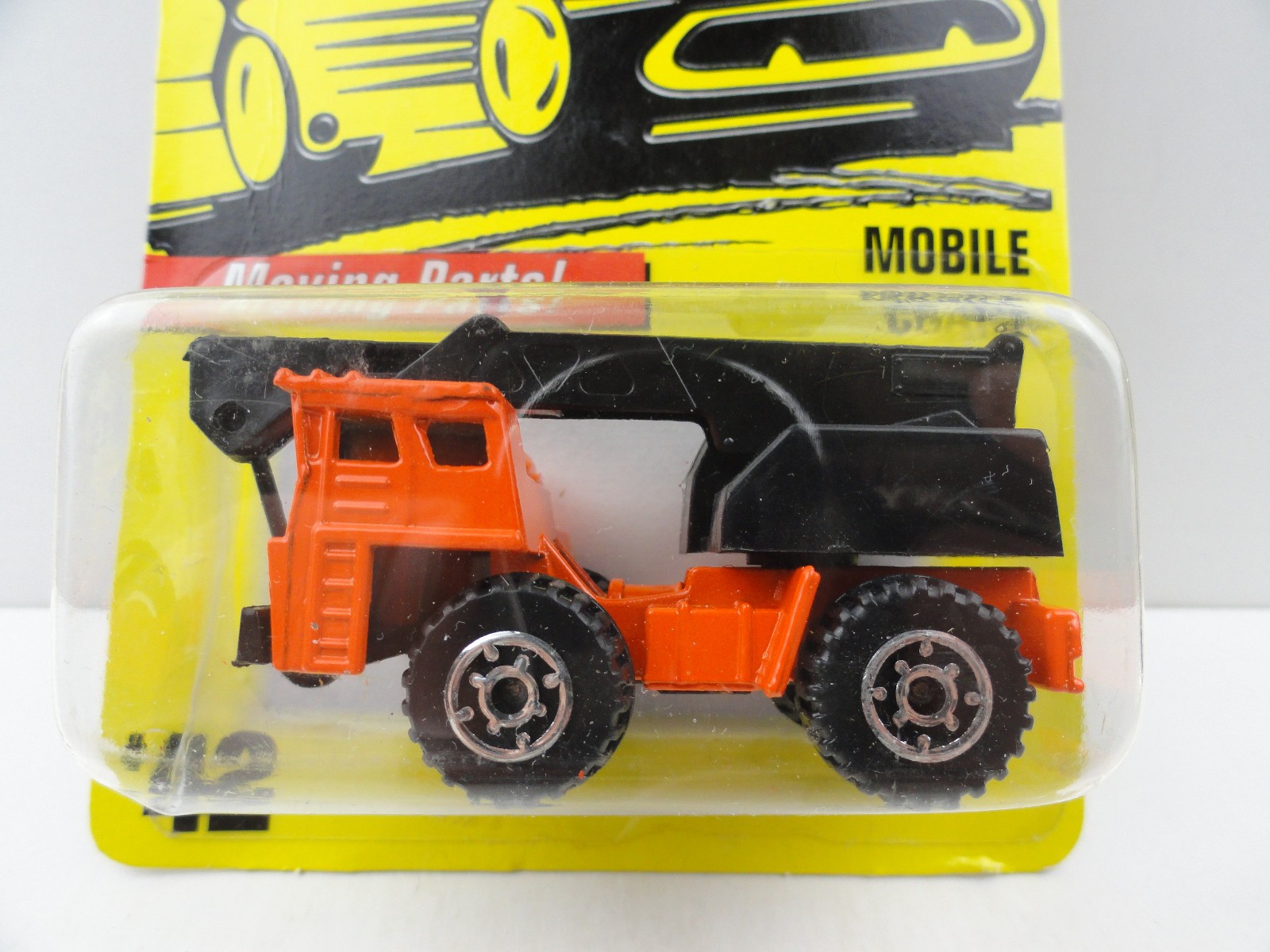 1997 Matchbox #42 Mobile Crane (Orange/Black Boom, Dented Blister)