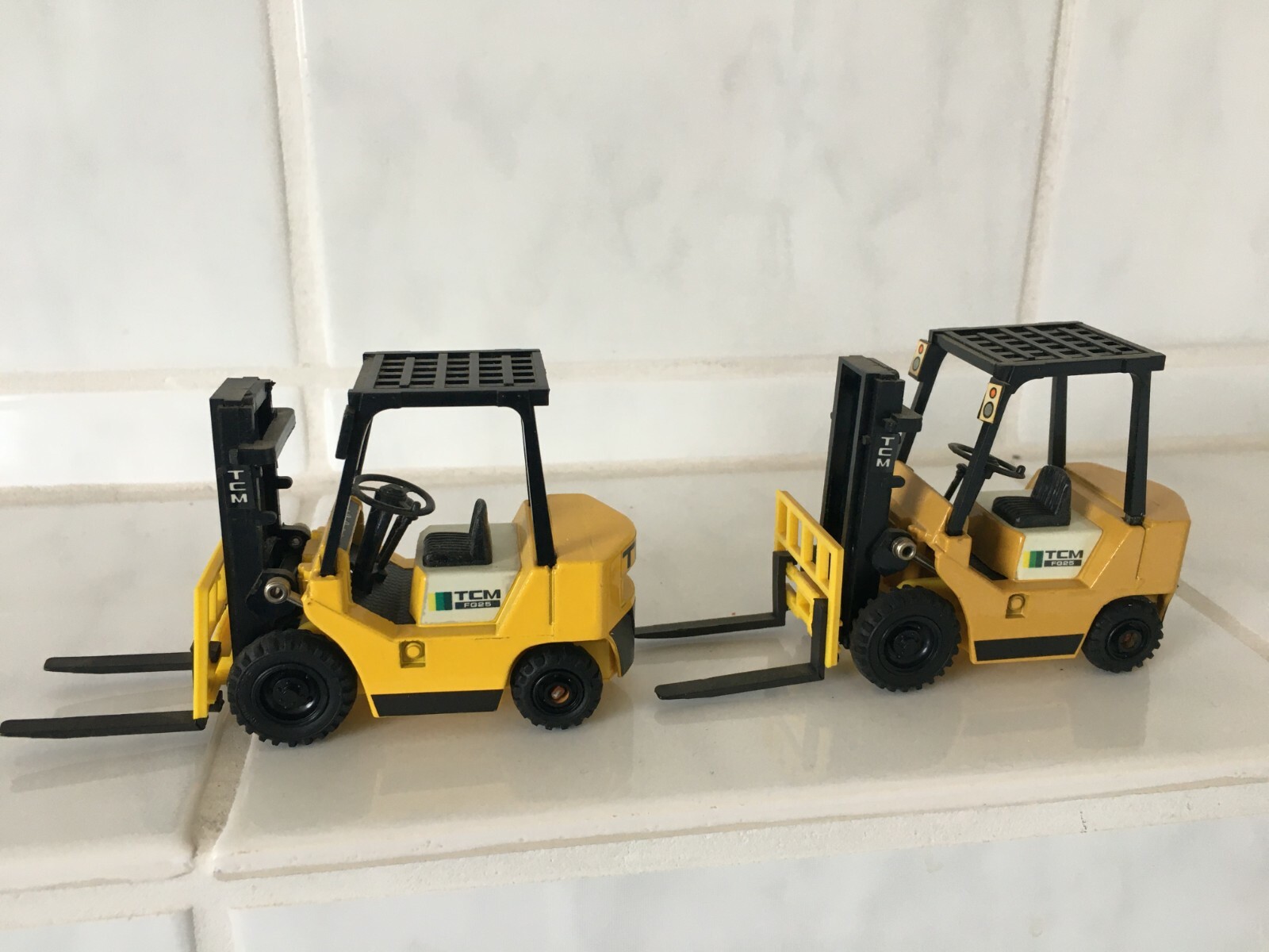 TCM ( = unicarriers ) LIGHT yellow forklift fork lift truck