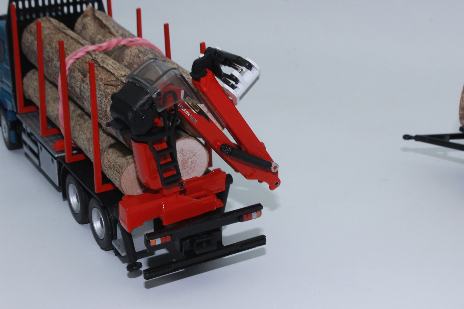Conrad 81233 DOLL Short Log Trailer MAN TGS TN EPSILON Q17Z Masterdrive 1:50 NEW