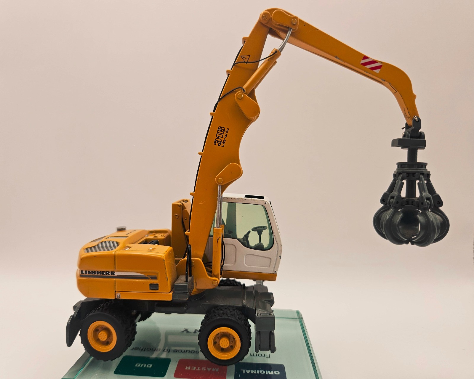 NZG 497 1:50 Scale Diecast Liebherr 316 Wheeled Excavator Scrap Handler Litronic