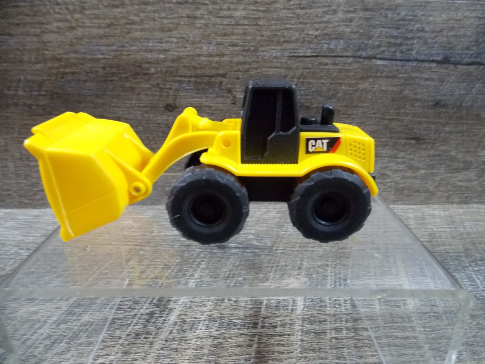 Yellow Metal & Plastic Tonka Tractor & 2 Plastic CAT Caterpillar Loaders 3 to 4″