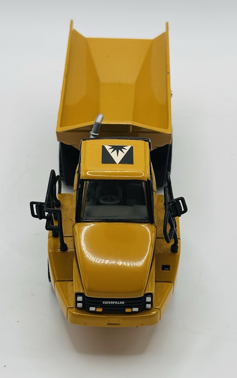 CAT Articulated Trucks: a 725 (Norscot) and a D250 (ERTL)