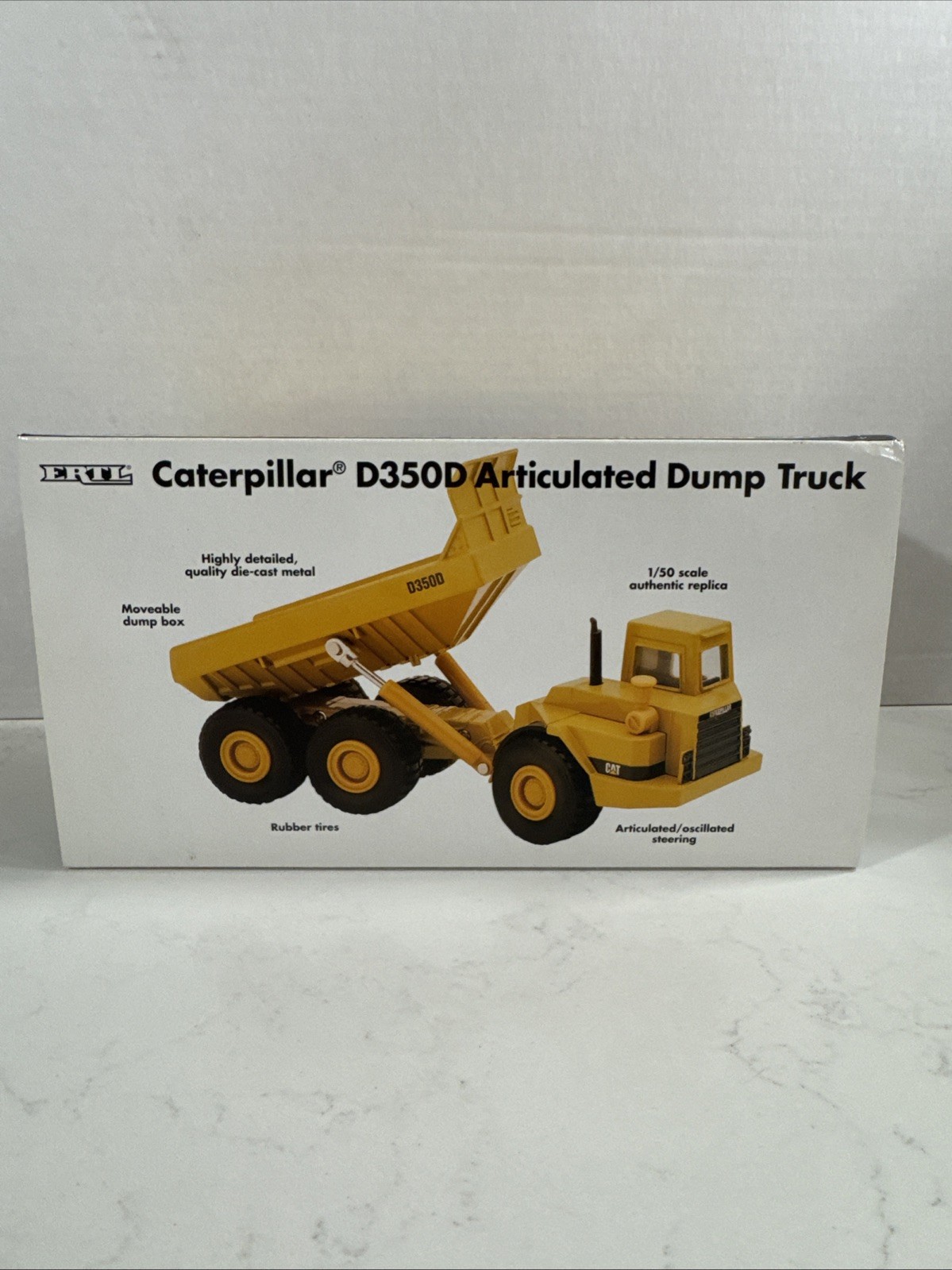 Ertl 2431 • Caterpillar • CAT D350D Articulated Dump Truck • 1:50 Scale NIB