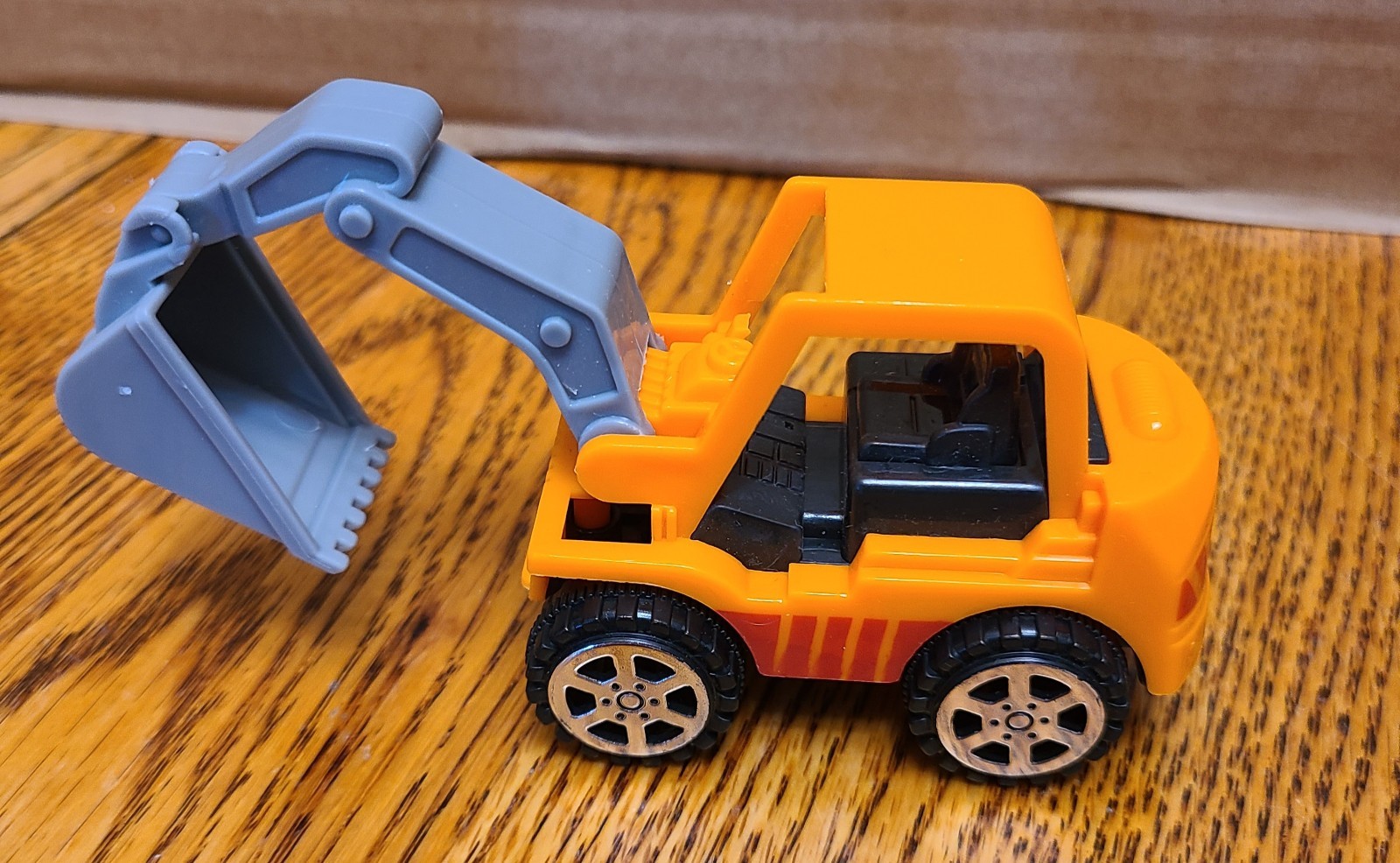 2 mini plastic construction toys Excavator and road roller