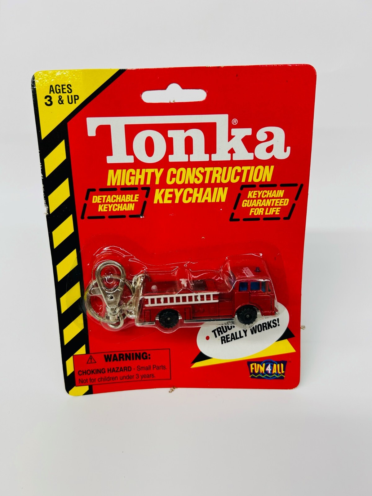 Bundle: 4 NOS Tonka Mighty Const Keychains | Toy Trucker & Contractor
