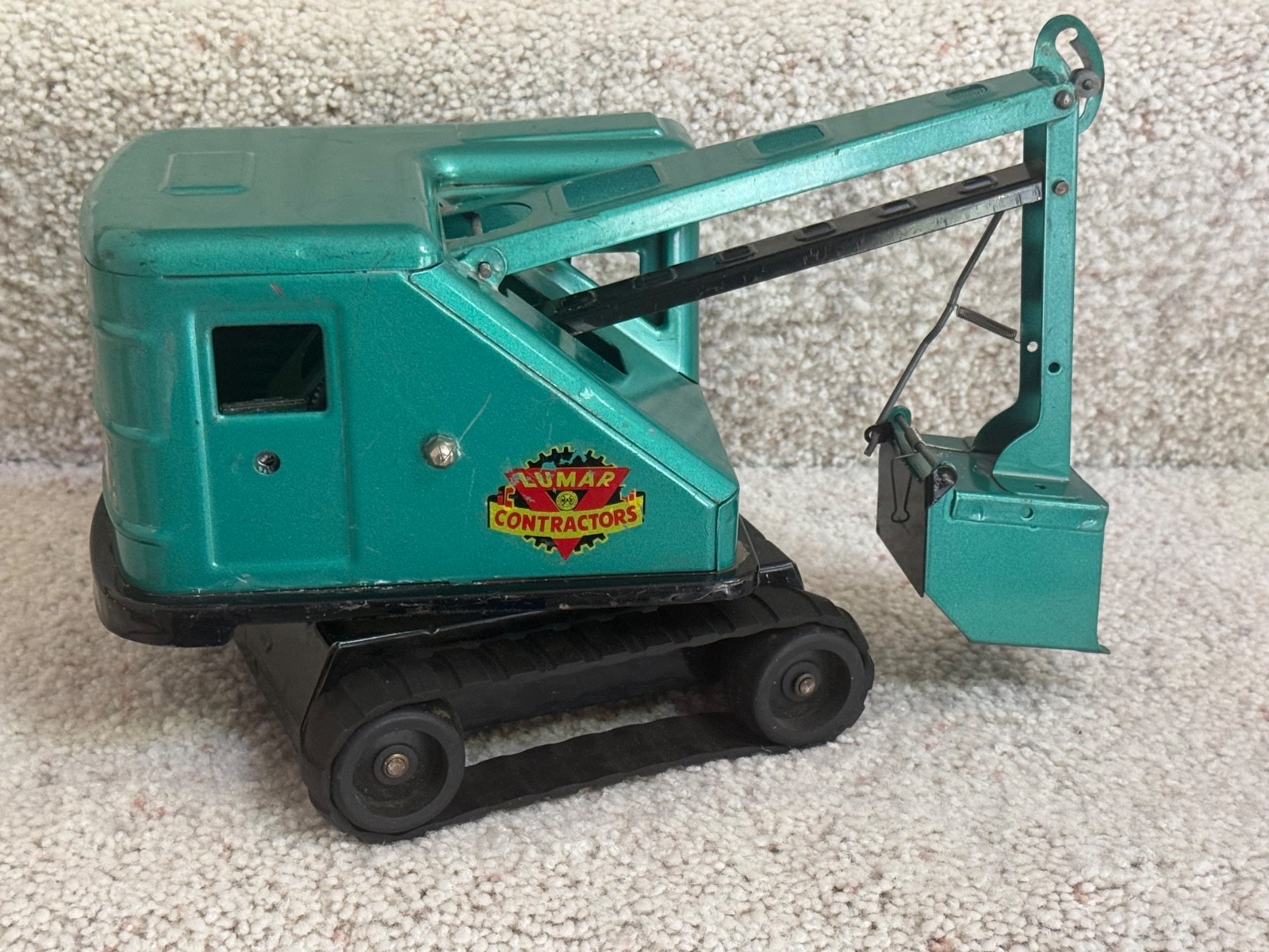 Vintage blue MARX pressed steel automatic Scoop Power Shovel