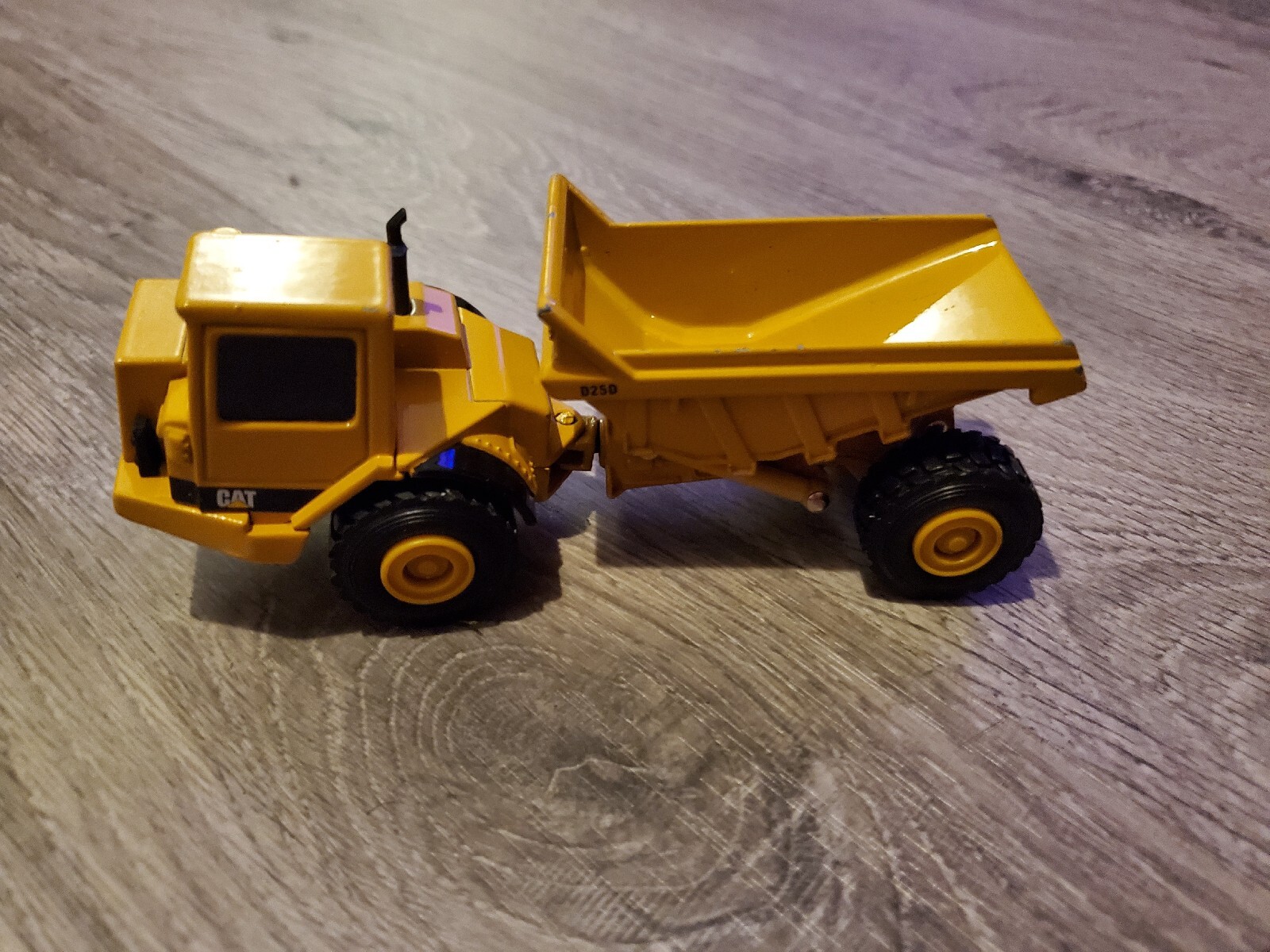 Norsscot CatD25D Articulated Dump Hauler Die-Cast Scale 1:64
