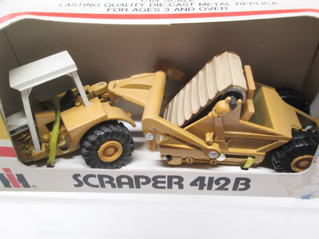 ERTL 1/64 MIGHTY MOVERS INTERNATIONAL CONSTRUCTION TOYS – LOT OF 4 – MINT-IN-BOX