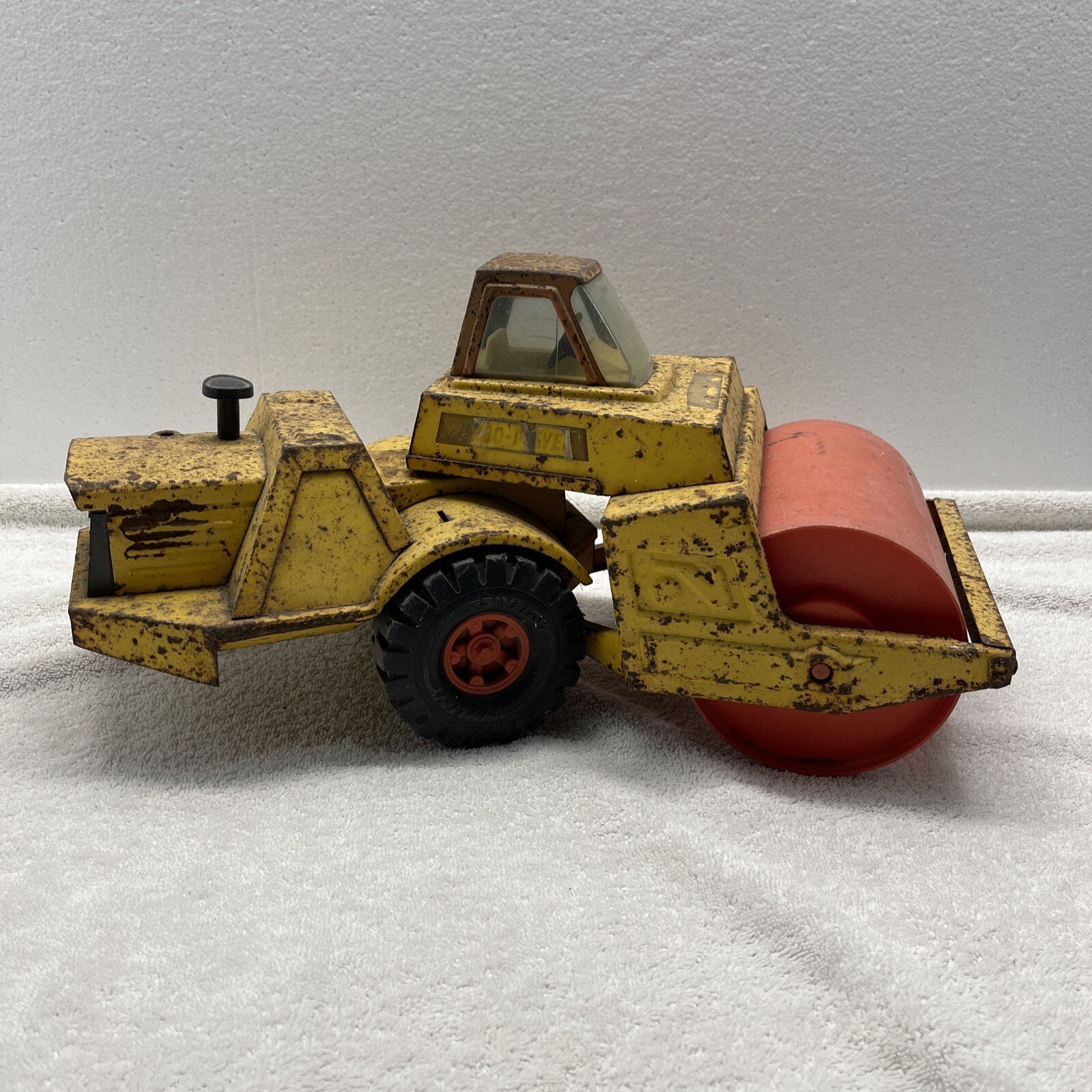 1970s Nylint Pressed Steel Yellow and Black 17” Turbo Articulating Steam Roller