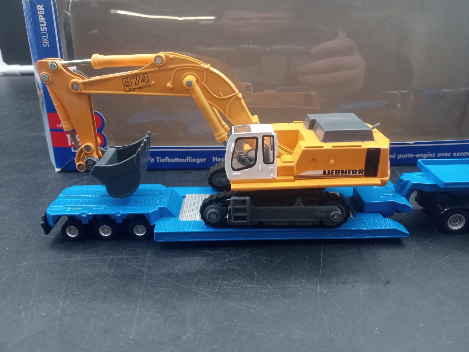 Siku #1847 1:87 Scale Heavy Haul Transporter, Flat Bed & Excavator