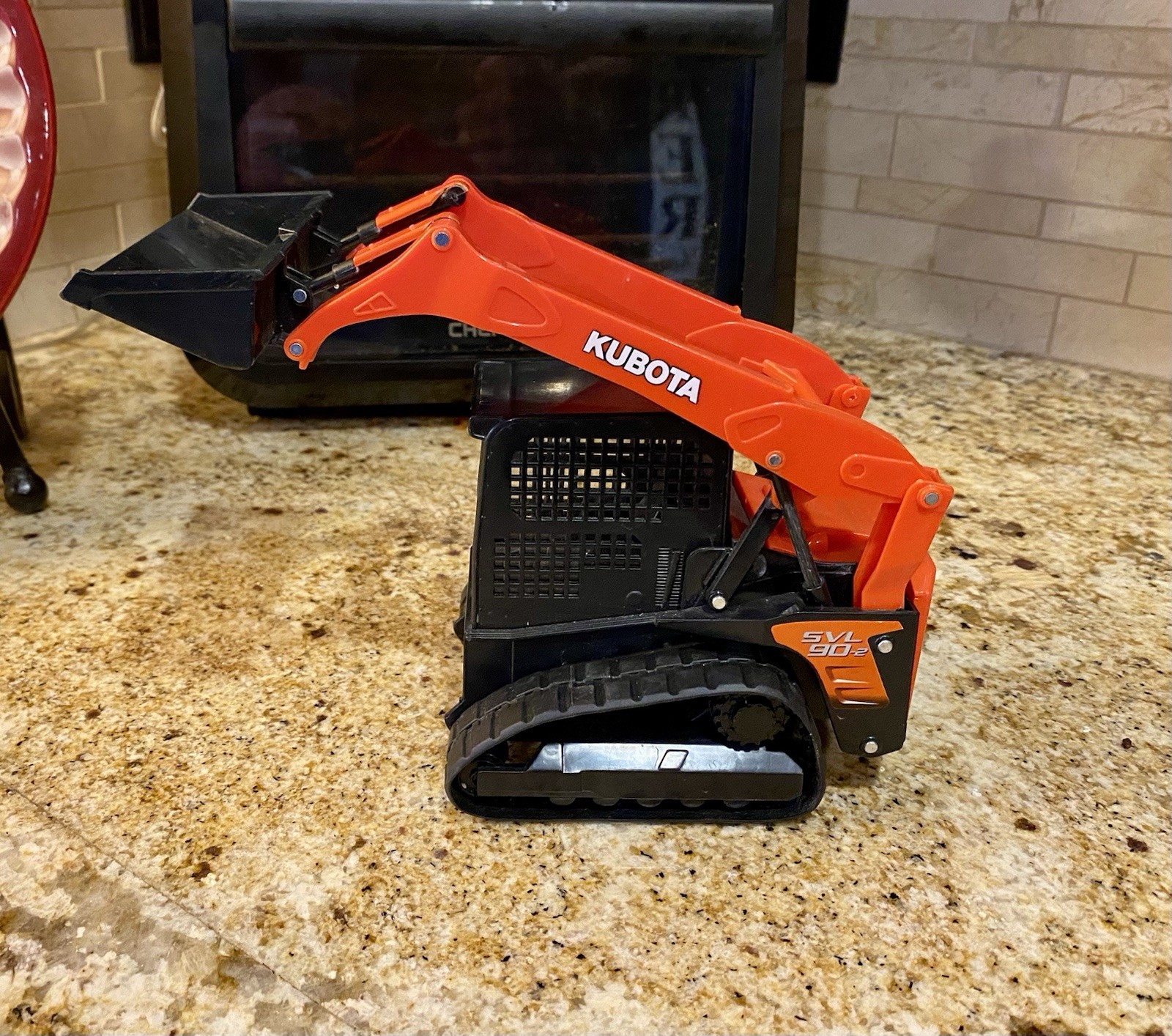 1/18 Scale Kubota SVL90-2 Tracked Skid Steer Loader Plastic Toy (8″) New-Ray
