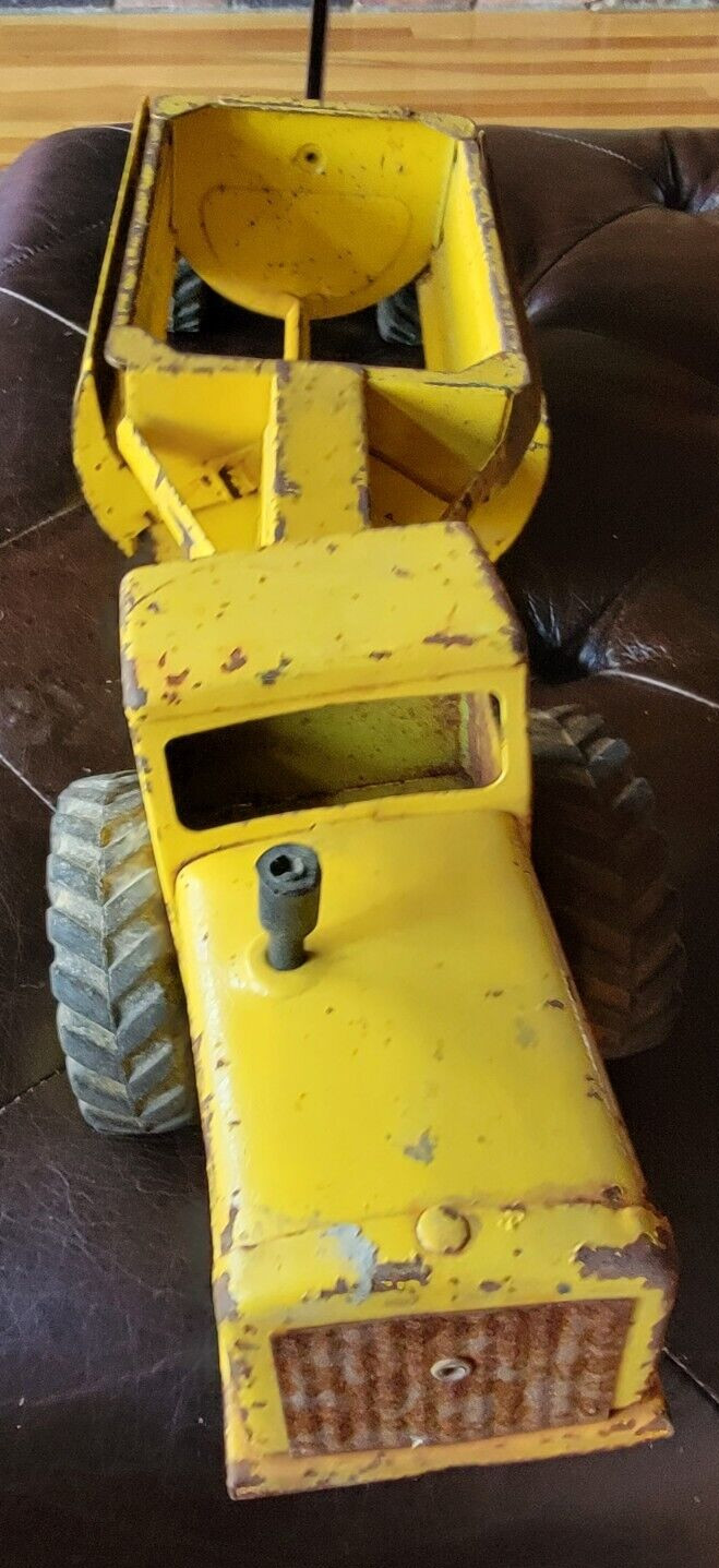 VINTAGE 1950’S NYLINT TOYS YELLOW TOURNEAU TOURNAHOPPER PRESSED STELL DUMPER
