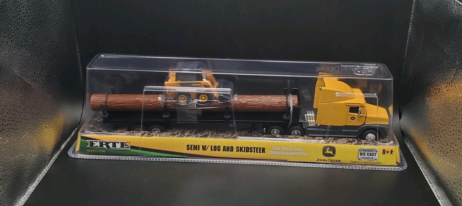 JOHN DEERE – ERTL SEMI W/ LOG AND SKIDSTEER 37382