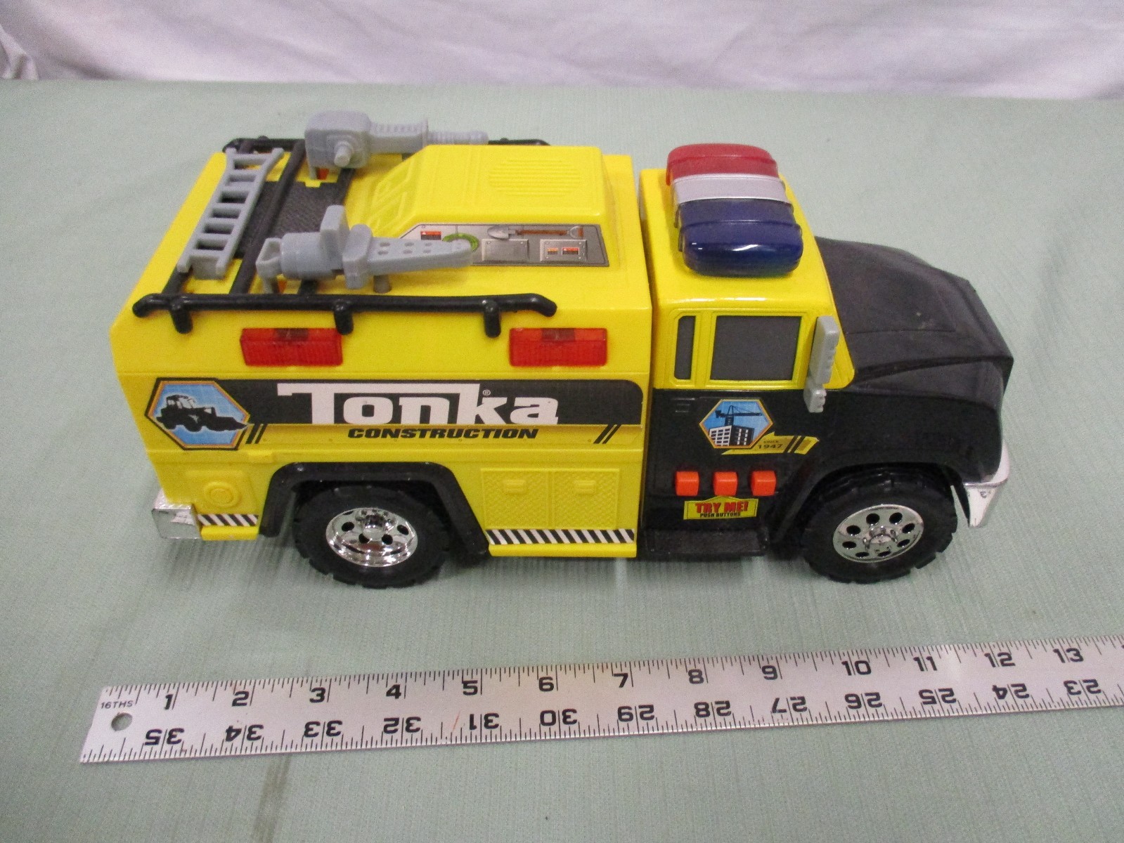 2011 Tonka construction truck with lights and sounds black front yellow back