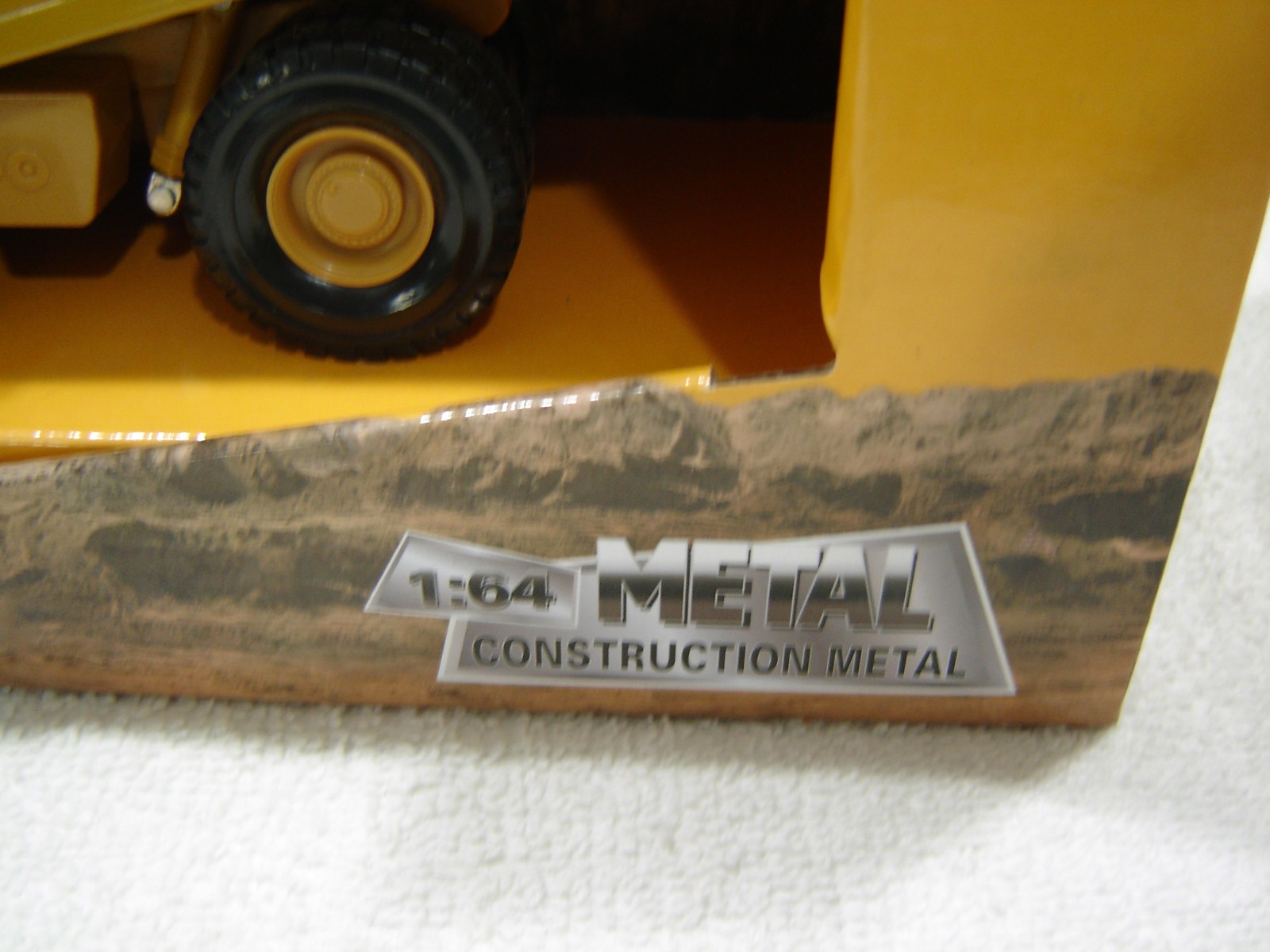 Caterpillar Cat 775E Off Highway Truck 1:64 Scale Diecast Masters
