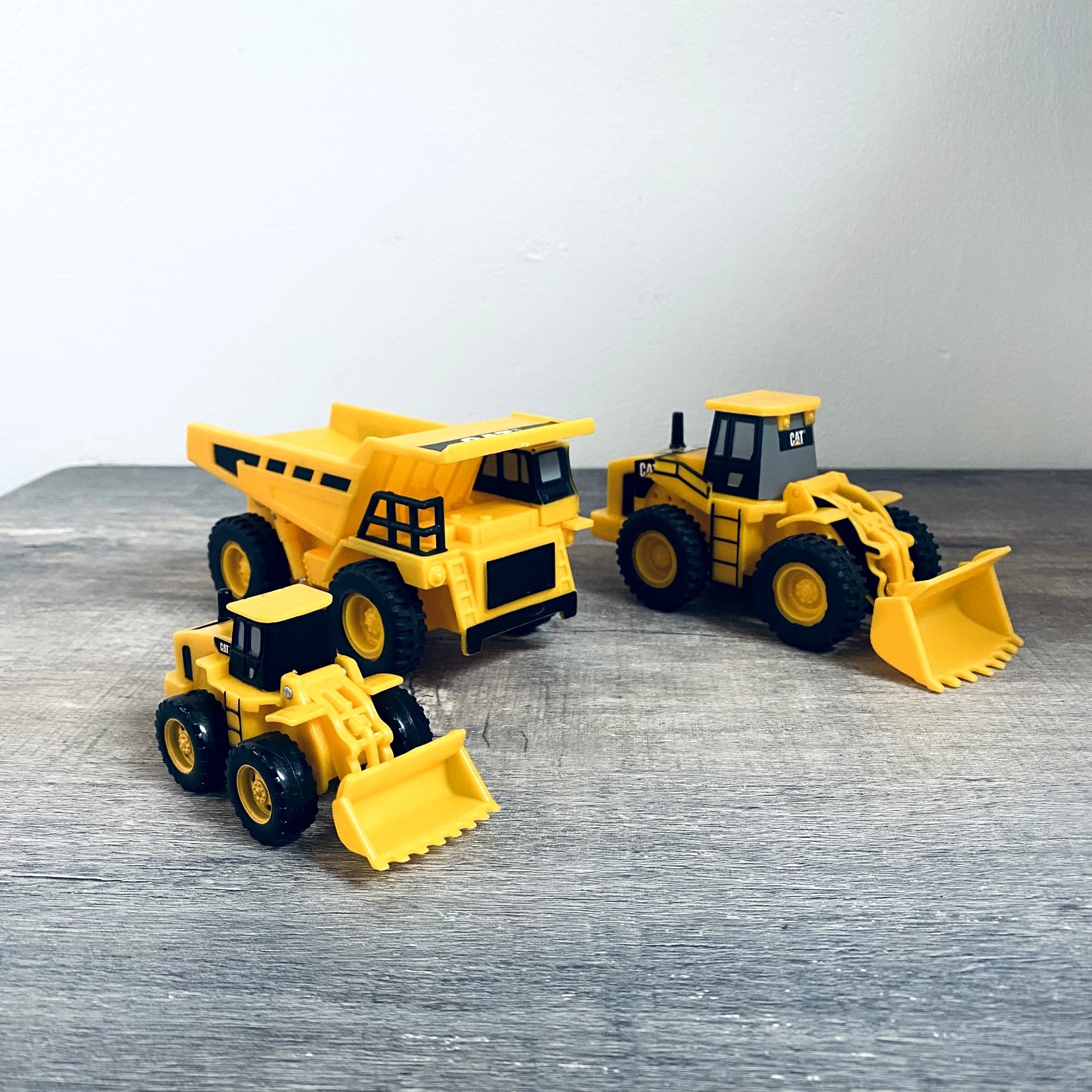 Toy State Caterpillar Dump Truck/Back Hoe/Plus Smaller Extra Unbranded Truck