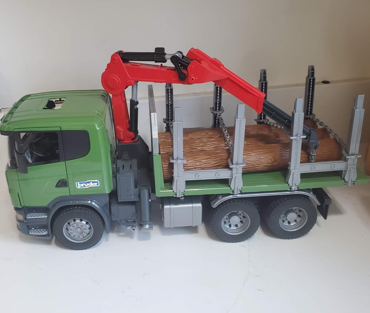 Bruder SCANIA Timber Truck with Loading Crane and 3 Trunks