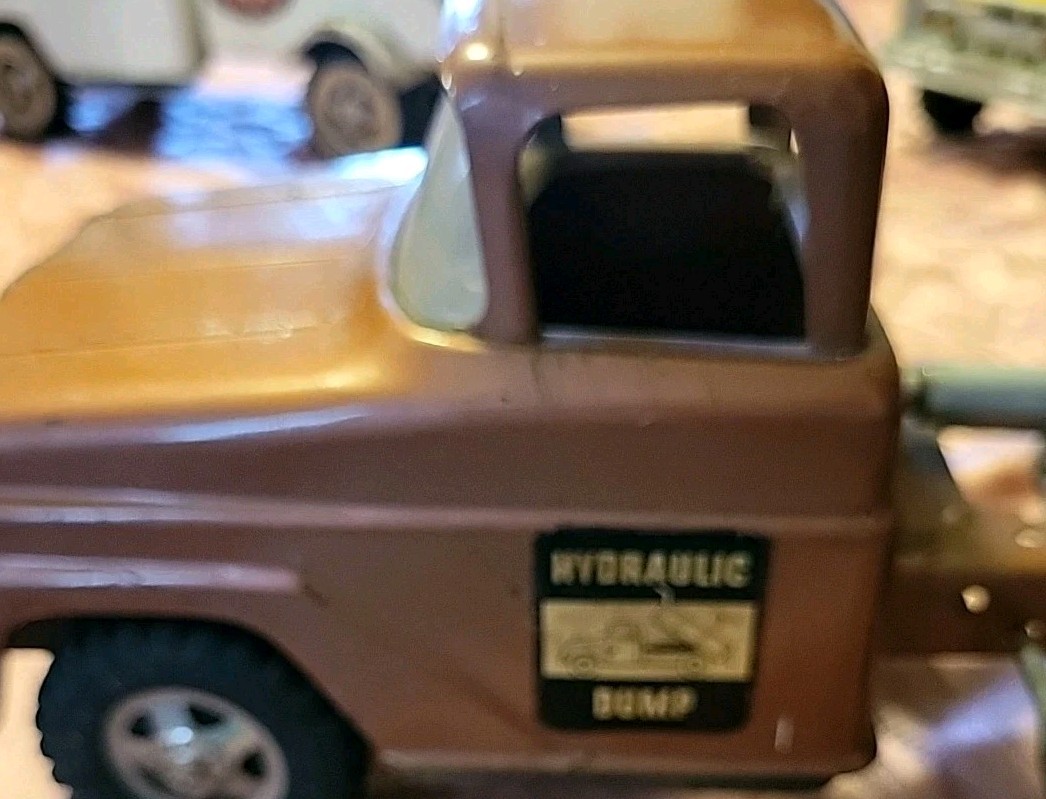 Vintage Tonka Hydraulic Bronze Dump Truck Toy Very Good Condition.