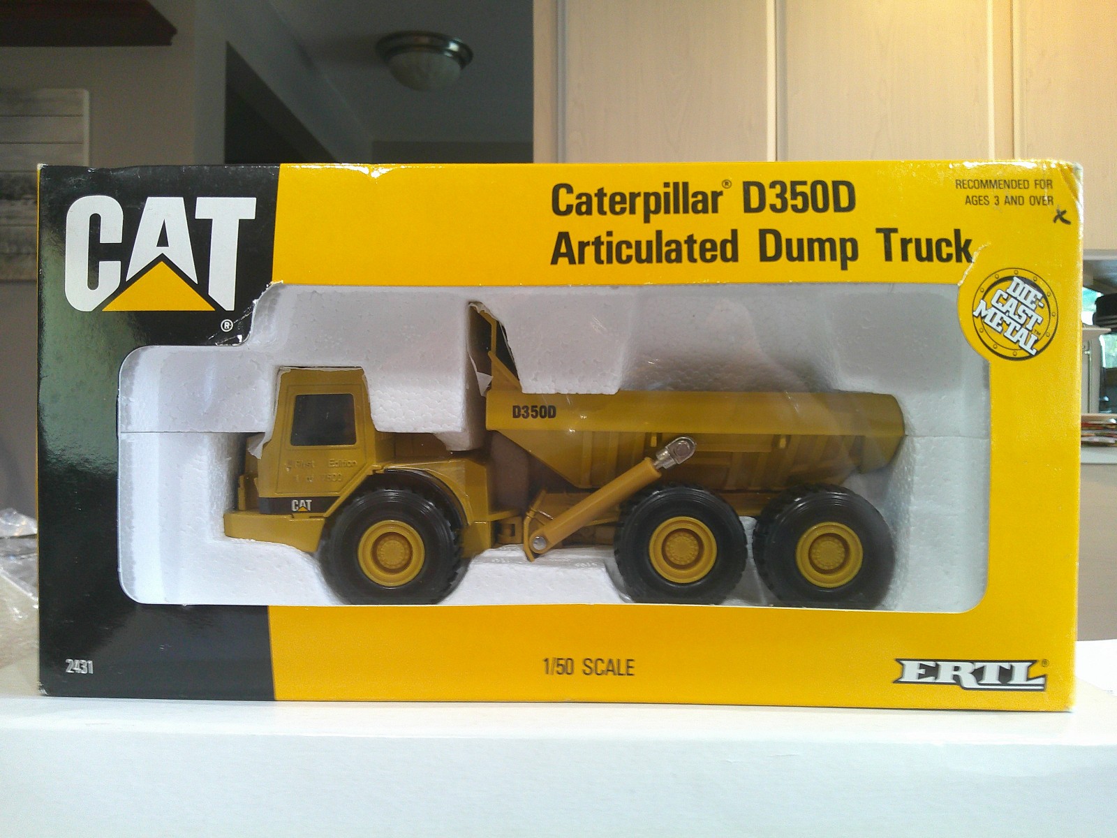 Ertl CAT D350D Articulated Dump Truck 1:50 Scale Darkish Yellow Good Package