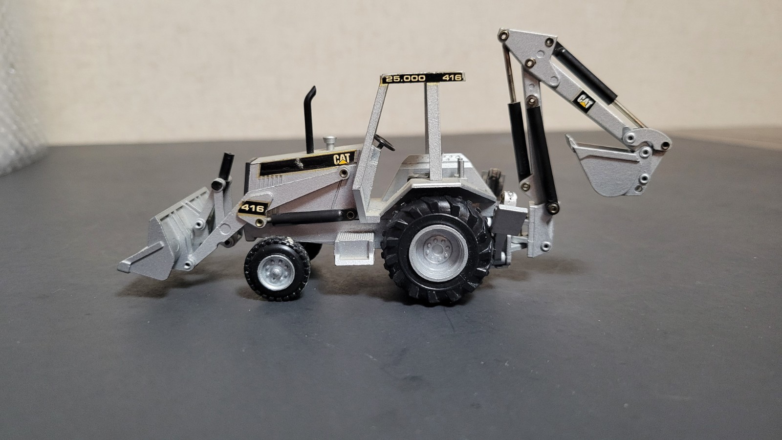 1:50 Scale Diecast CAT 416 Backhoe Loader- SILVER Limited Edition – NZG 285